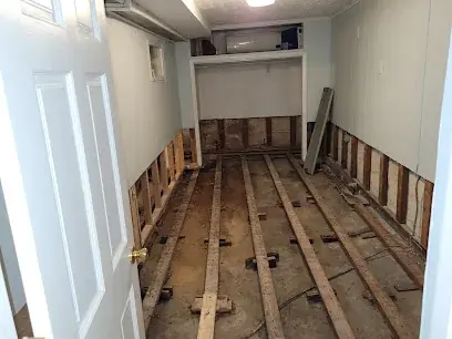 Floorboards up in a hallway