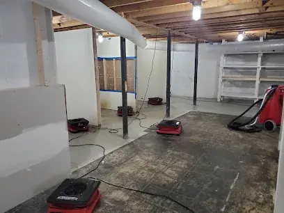 Air movers drying a Buffalo basement